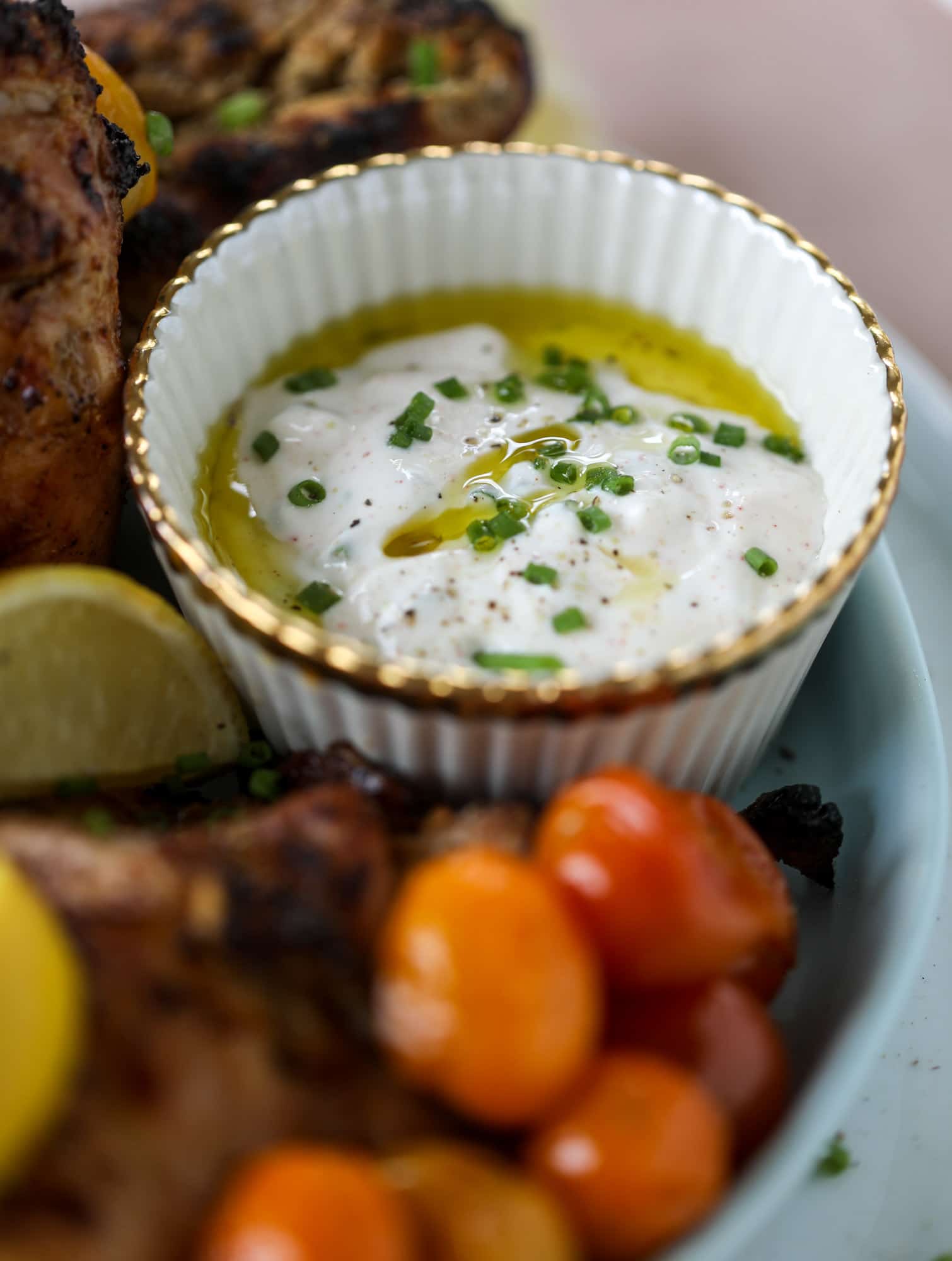 This yogurt marinated chicken recipe is super flavorful, tender, juicy and delicious. The fresh lemon adds a kick of flavor and it