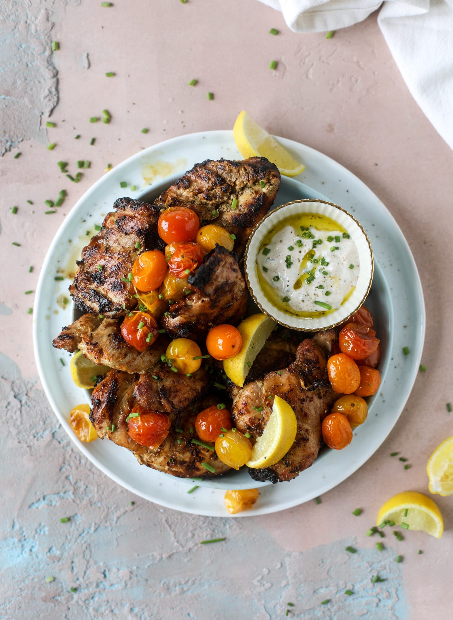 This yogurt marinated chicken recipe is super flavorful, tender, juicy and delicious. The fresh lemon adds a kick of flavor and it